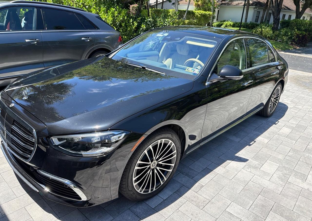 Black Mercedes-Benz S-Class before enclosed transport from Boca Raton