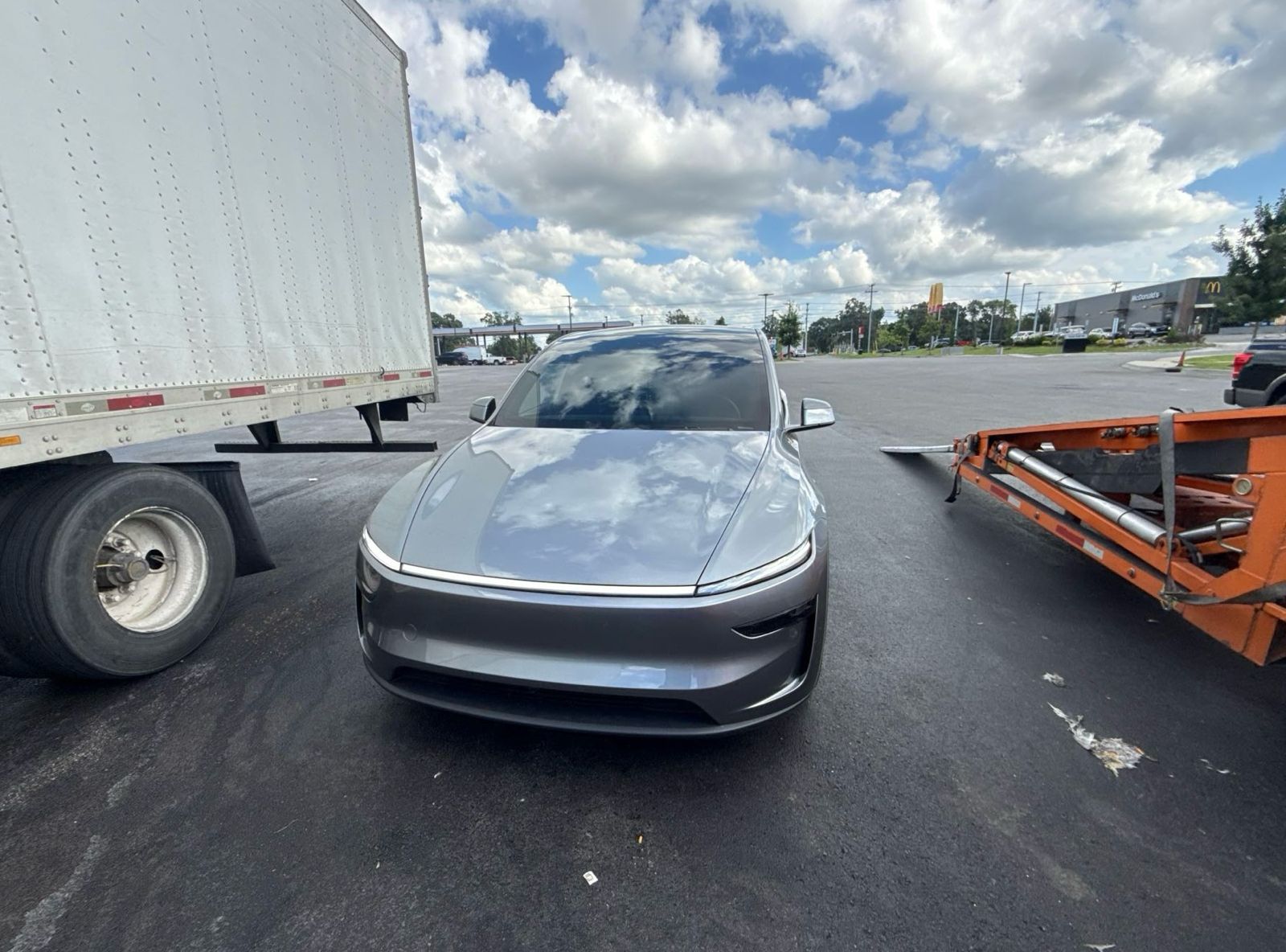 Electric sedan loaded on the 9-car hauler bound for Arizona